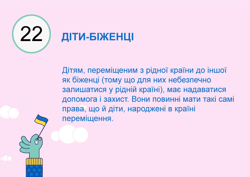 hand som håller ukrainsk flagga med text på ukrainska om artikel 22