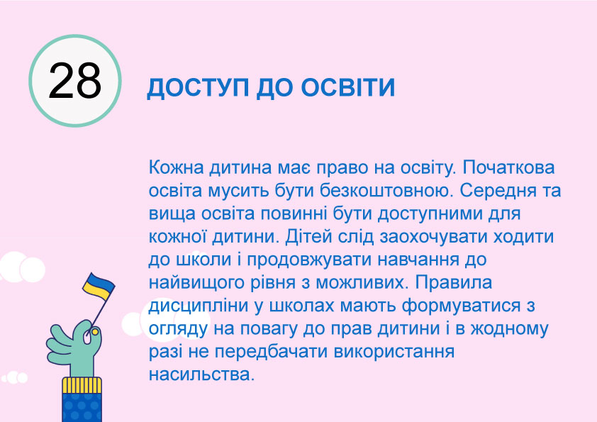 hand som håller ukrainsk flagga med text på ukrainska om artikel 28